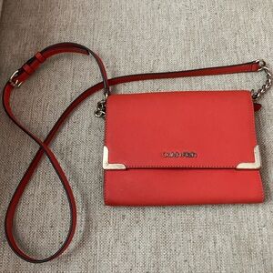 Calvin Klein orange leather crossbody purse